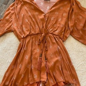 Shop Reddress orange romper